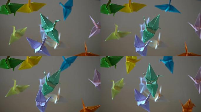美丽的折纸纸鸟在风中摇曳，日本传统艺术