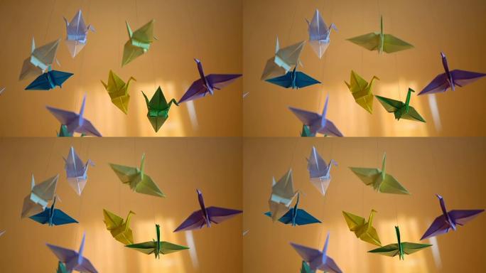 创意折纸纸鸟背景，线程上的手工玩具，想象力
