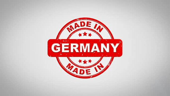 德国制造签名盖章文字木制邮票动画。红色墨水在干净的白纸表面背景与绿色哑光背景包括在内。