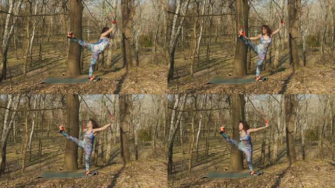 年轻女子在户外练习重力