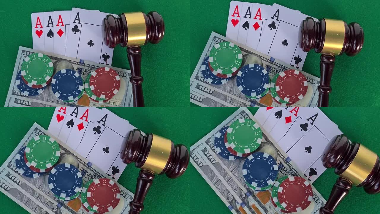 法官用木槌和扑克牌扑克牌筹码放在绿色桌子上