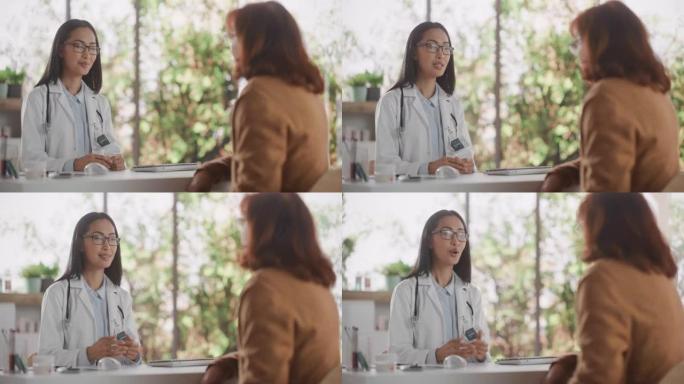 一位亚洲医疗保健专业人员的肖像，在现代医疗诊所的咨询期间，在为她的医疗状况开处方治疗之前，听取了一名