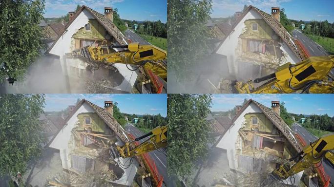时间流逝大型挖掘机摧毁了一栋老房子