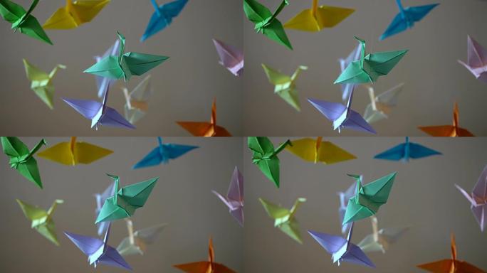 悬挂在空中的多色纸鸟，日本折纸艺术，爱好