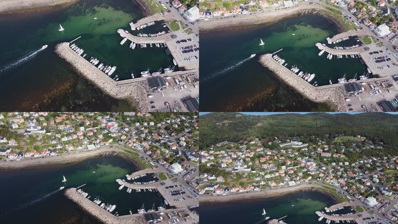 多莉 (Dolly) 在瑞典莫勒 (Molle) 开业夏天，背景中可以看到船只，码头和房屋。