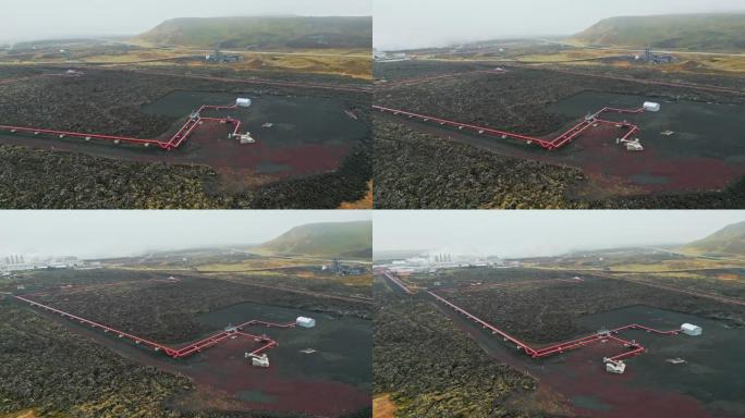 无人机在冰岛的地热发电厂，热水电站周围飞行