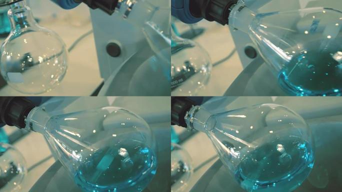 在化学实验室中，烧瓶旋转以混合溶液
