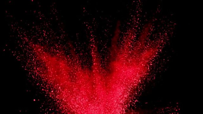 红色粉末以超慢动作在黑色背景上爆炸