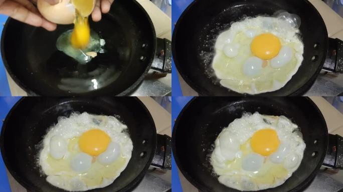 手敲鸡蛋到锅里
