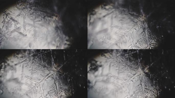 水结晶成雪花并融化。显微镜下的俯视图