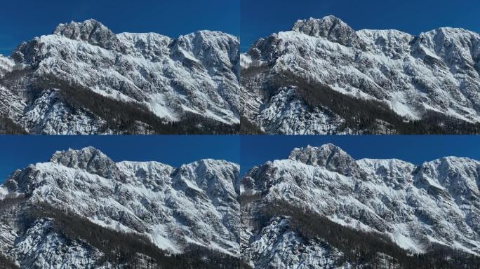 晴天空中无人机拍摄雪山链