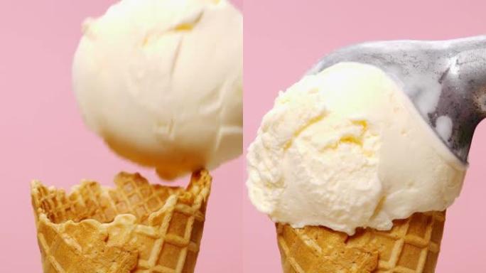 香草冰淇淋在粉红色背景上的圆锥形，美味的冰淇淋概念。