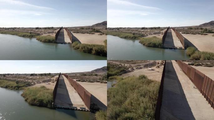 国际墨西哥边境墙，科罗拉多分流大坝在亚利桑那州尤马和阿尔戈多内斯之间的屏障，墨西哥北部的下加利福尼亚