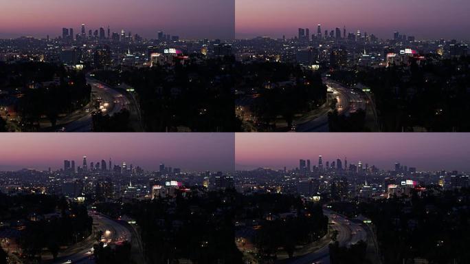 日出前洛杉矶的固定无人机拍摄-好莱坞，韩国城和市中心