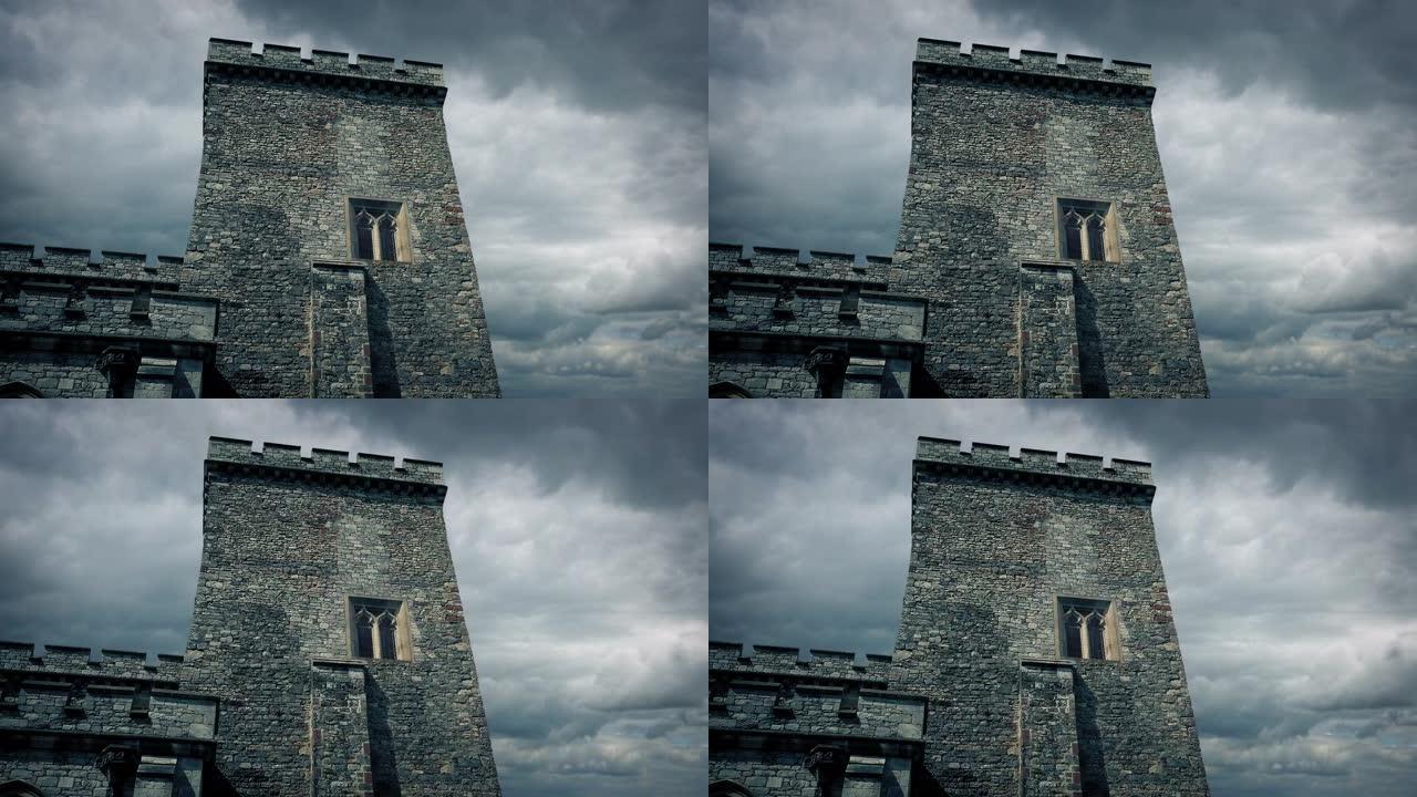 云层在上面移动的城堡炮塔