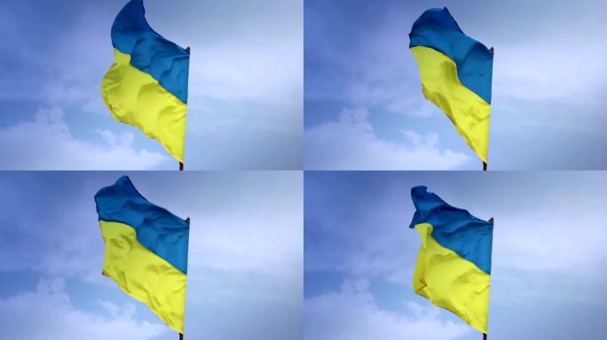 蓝天上飘扬的乌克兰国旗。乌克兰
