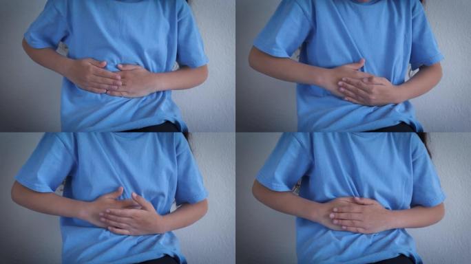 室内患有胃痛的孩子。