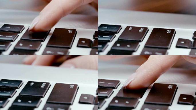 慢动作，女人的手指按钮进入笔记本电脑键盘，电子商务的概念