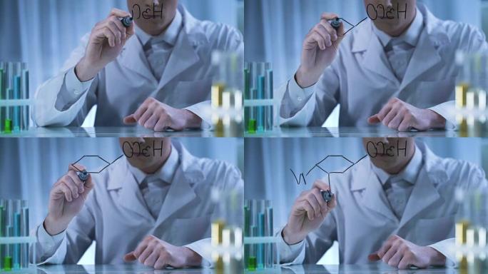 科学家在透明板上写化学式，药物研究