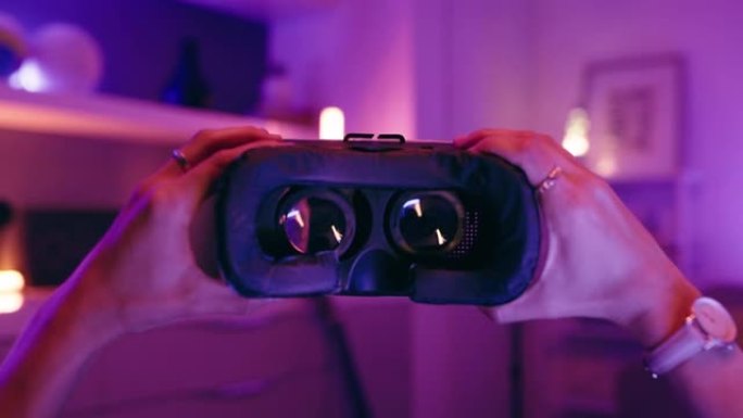 使用护目镜在霓虹灯室中访问ai或3d视频游戏的人的虚拟现实，metaverse和pov。手持、游戏和