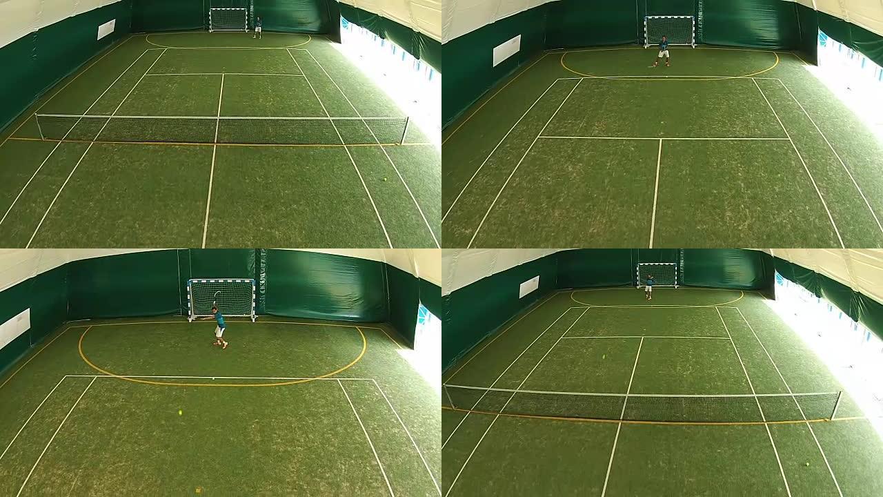 年轻人在球场上打网球