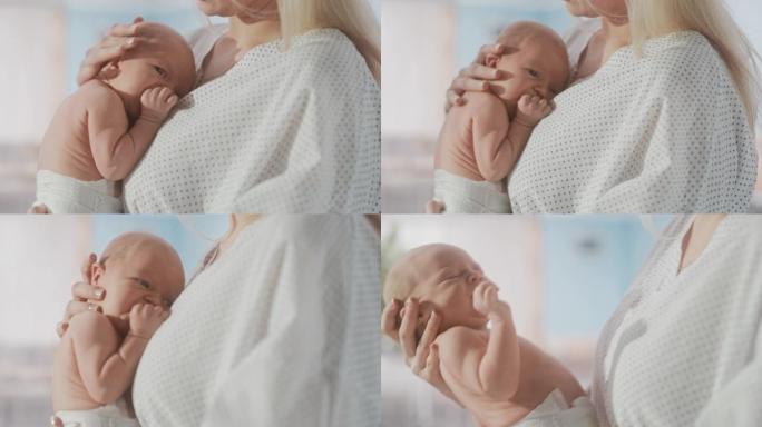 一位母亲抱着她的新生儿，在现代产科诊所与小婴儿建立联系。白人妇女抱着她的孩子。医疗保健、孕产和孕产概