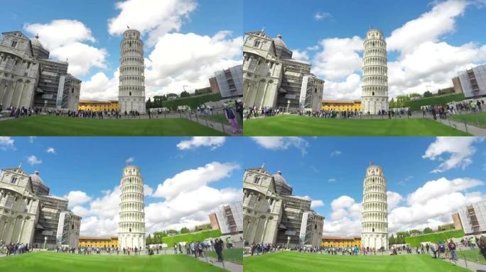 游客参观意大利著名的比萨斜塔。夏云延时