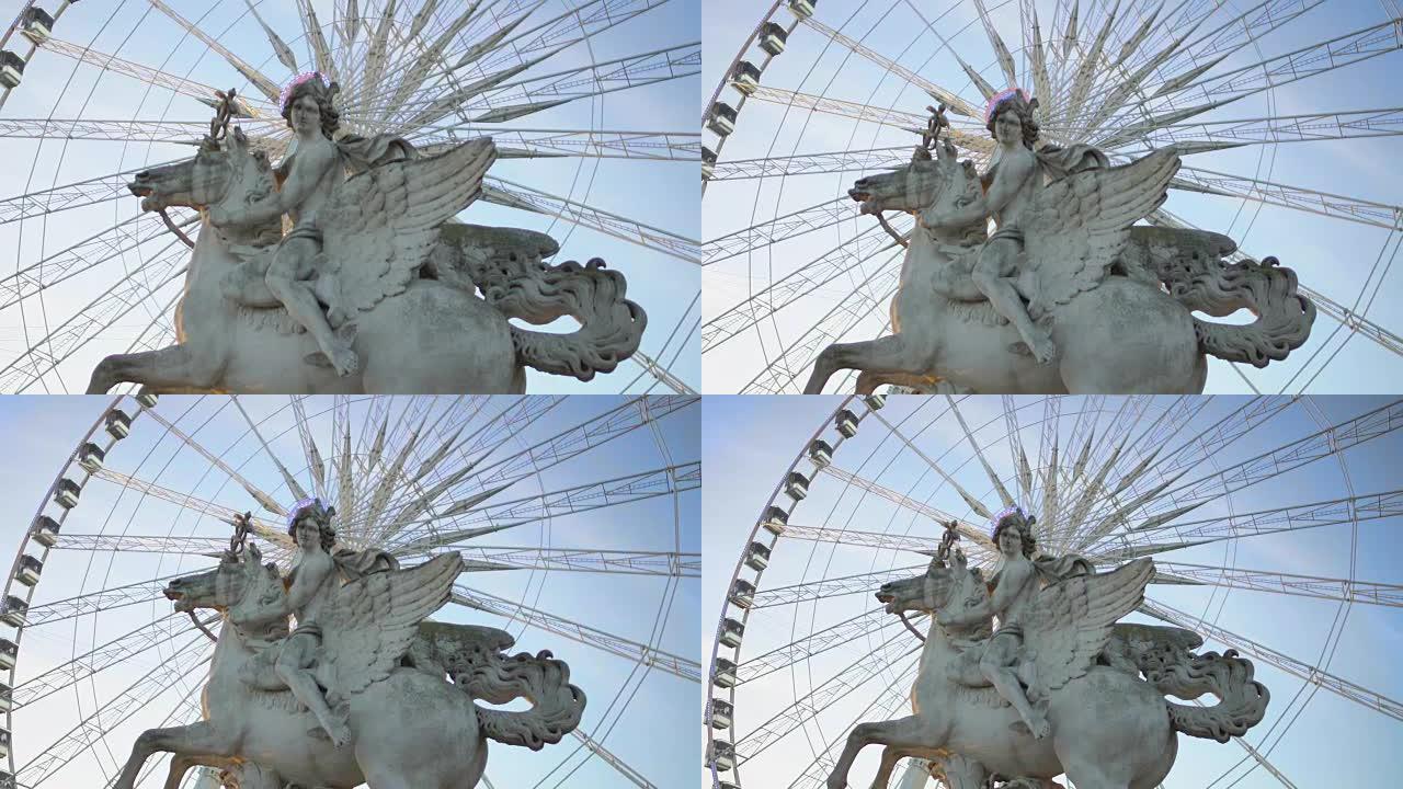 从后面工作的大轮子照亮飞马座马术雕像周围的光环