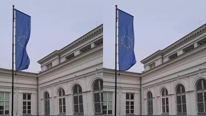 欧盟旗帜在多云天气中缓缓飘扬。垂直视频。