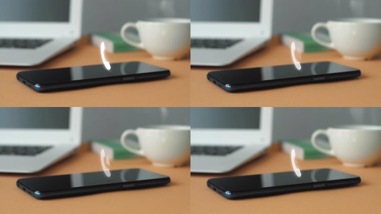 在智能手机屏幕上对着笔记本电脑和一杯咖啡的来电的3d动画。