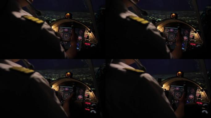 细心的飞行员专业驾驶飞机，在大都市上空夜间飞行
