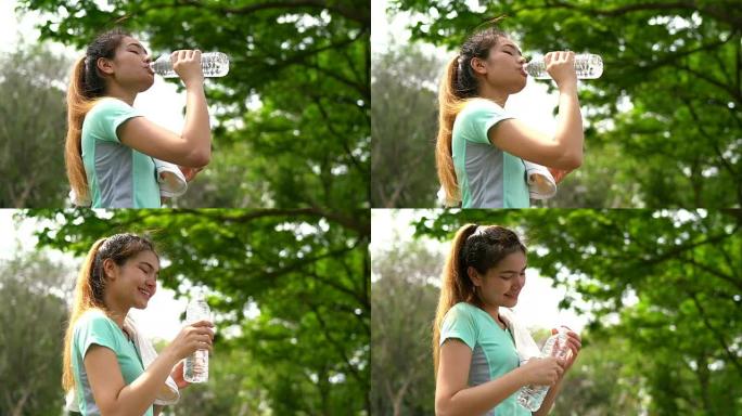 Women are drinking cool water in the park and woma