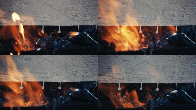 金属火盆中温暖舒适燃烧的大火的特写镜头。慢动作。高清视频格式。