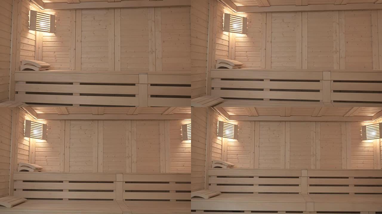 现代木制桑拿，有两条长凳和两盏灯