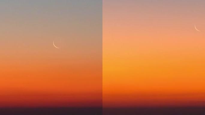 红色的黎明在海上，几乎不明显的月亮。太阳出现在水面上。延时。垂直视频社交媒体。