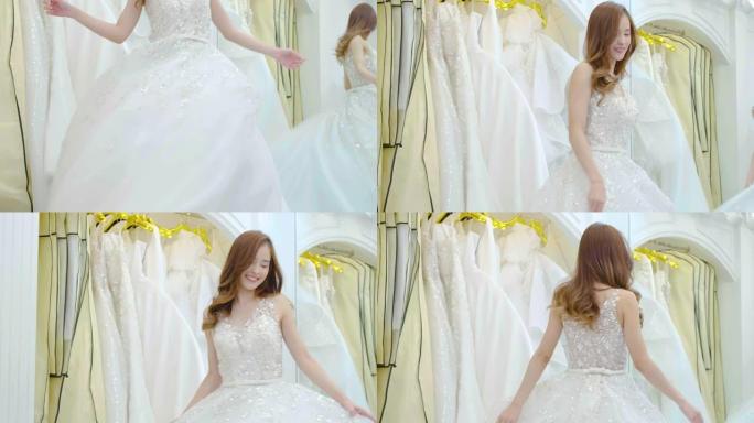 美丽的新娘穿着白色连衣裙转过身来。幸福女人在婚礼当天摆姿势，享受庆祝活动，幸福女人在婚礼当天主题概念