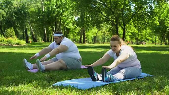 肥胖夫妇做运动，一起开始健康的生活方式，支持