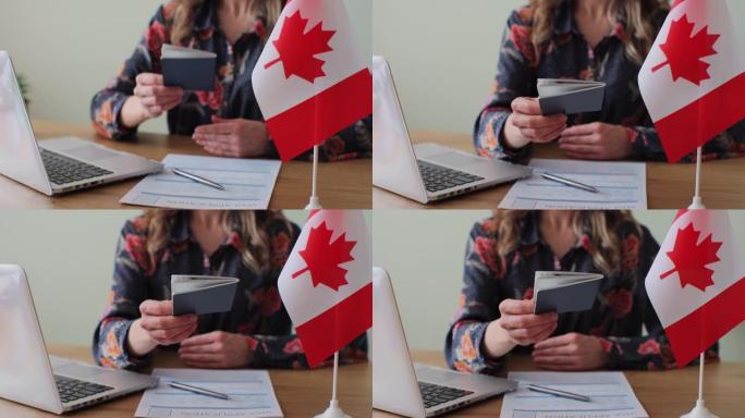 加拿大女领事官员给男性移民护照，工作签证，公民身份。签证申请在线形式移民概念。签证审批。