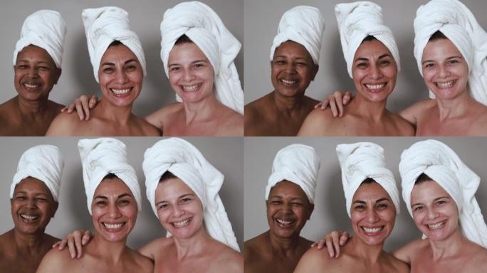 多种族女性在镜头前微笑-不同肤色的成熟人群-美容日和护肤疗法概念