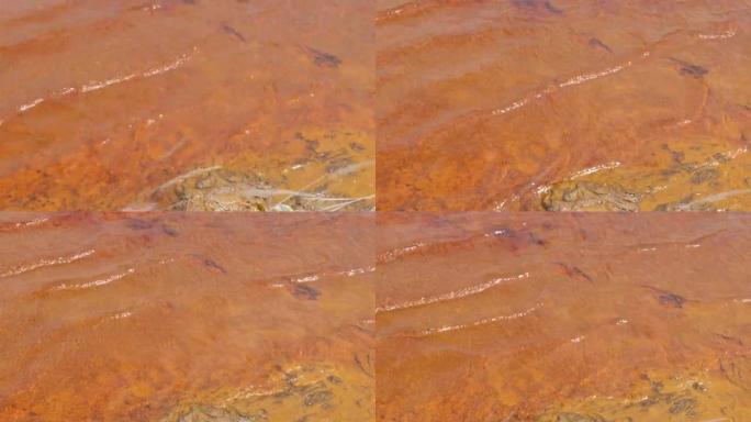 金属矿4k镜头中酸性水的红色流出波