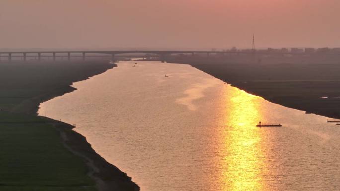 大河落日麦田飞鸟夕阳孤舟船北方春天