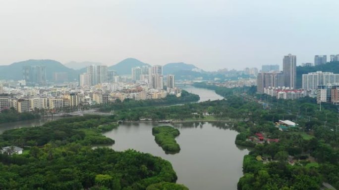 日落时间海南岛三亚城市景观公园湖空中全景4k中国