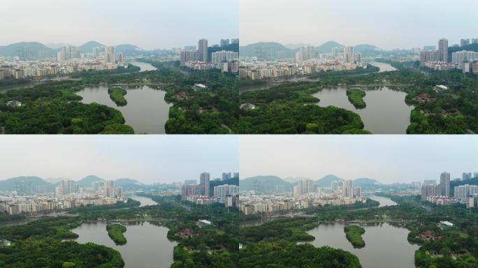 日落时间海南岛三亚城市景观公园湖空中全景4k中国