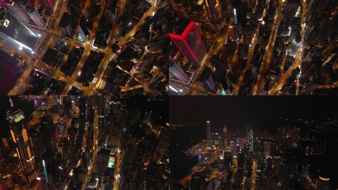 夜间照明香港城市景观市中心交通街道空中俯冲全景4k