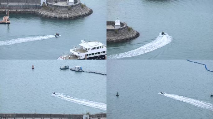 游客坐摩托艇出海观光