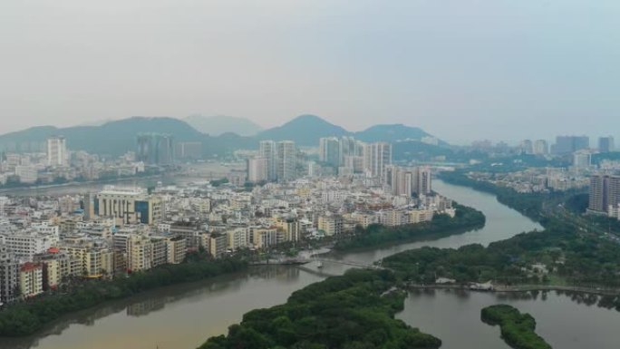 日落时间海南岛三亚城市景观河畔空中全景4k中国