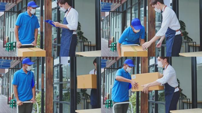 亚洲邮递员将食品配料盒送到咖啡馆的餐厅服务员。有吸引力的咖啡师工人因新型冠状病毒肺炎而戴口罩，签收包