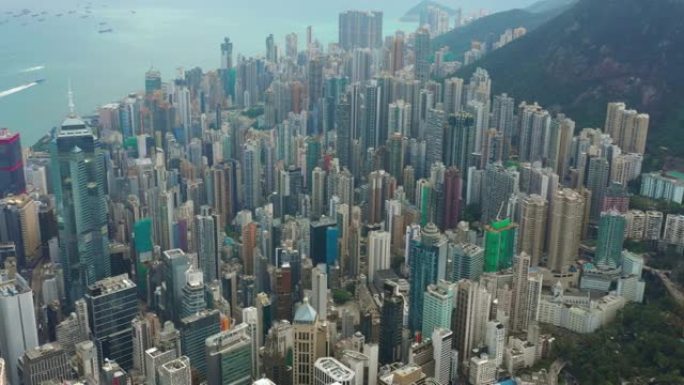 晴天飞越香港城市景观市中心生活区空中全景4k