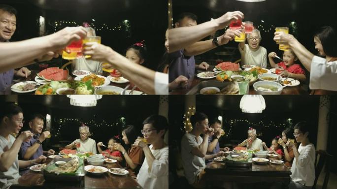 东南亚家庭晚上在家吃晚饭-股票视频