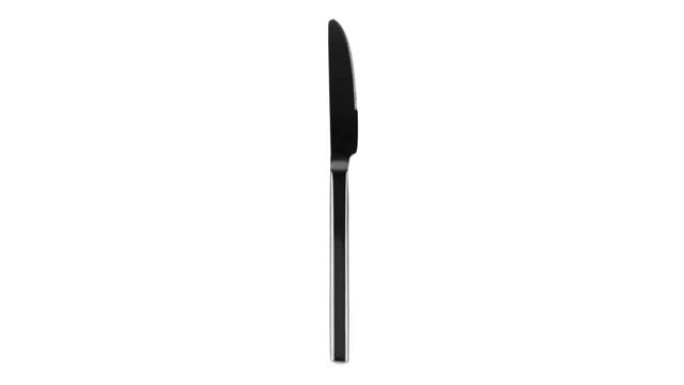 白色背景上的黑色叉子、刀子和勺子，餐具或餐具的定格动画